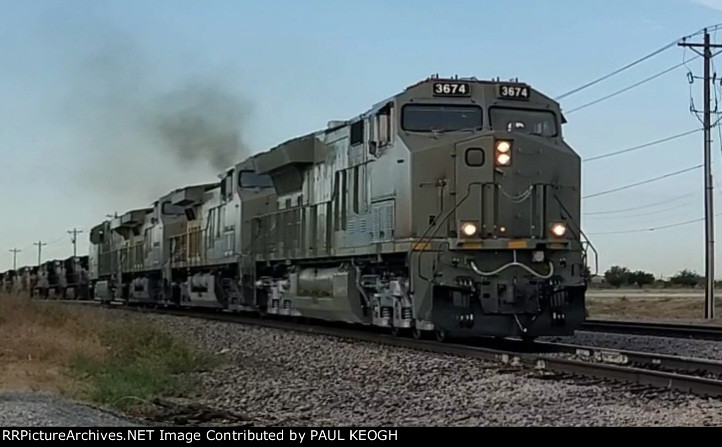 BNSF 3674 Leads A Consist of New and Remodeled Locomotives.  